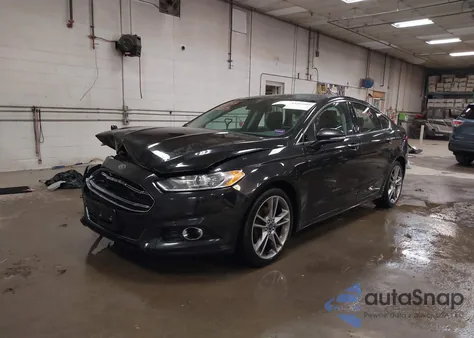 2015 Ford Fusion Titanium z USA, uszkodzony, nr VIN 3FA6P0D99FR139850